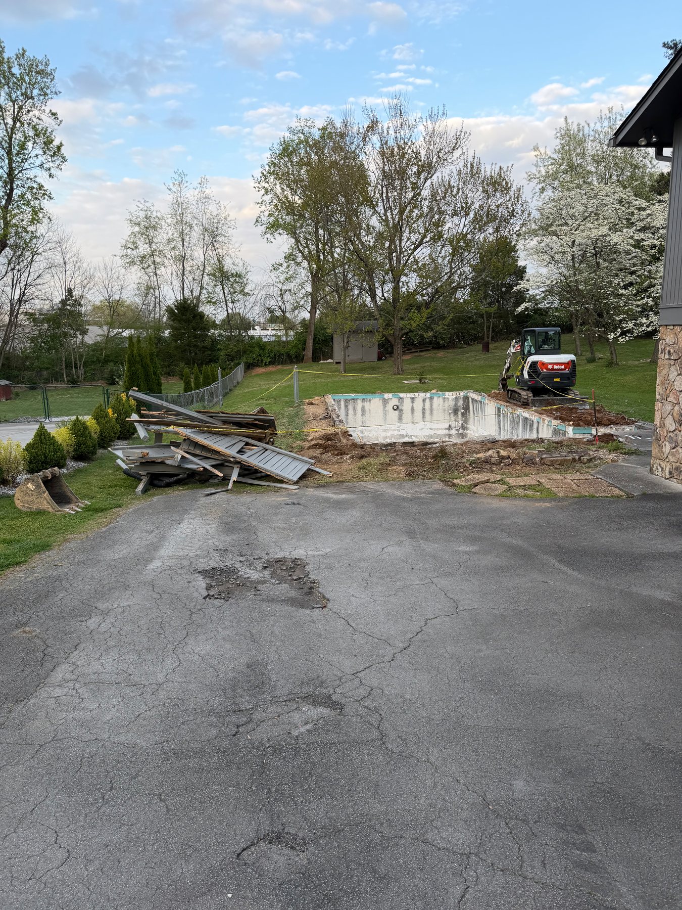 Pool removal and demolition cleanup area on a BECS project