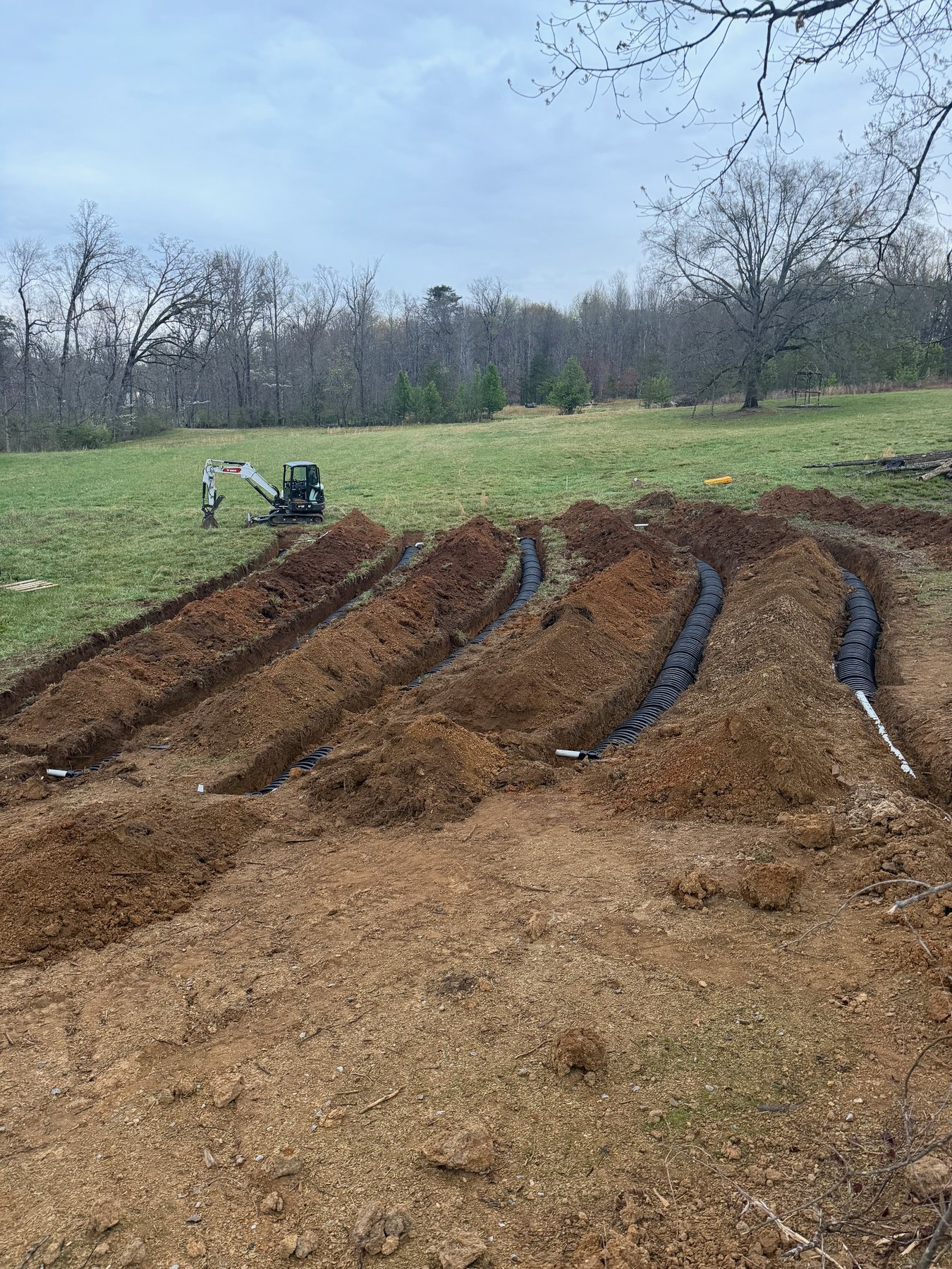 Septic field layout with trenches and pipe installed by BECS